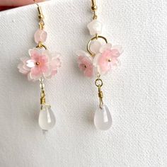 *Elegant pink quartz sakura star dangle earring. Unique design high quality *Material: pink quartz/Chalcedony/plastic/glass bead/14k gold plated hook *Color: pink&white 🤍Hypoallergenic 🤍 Handmade with love 🤍Click👇🏻 Find more Jewelry https://www.etsy.com/shop/WandWZONE 🤍 SHIPPING 🤍  * USPS First Class Shipping Service with tracking number * All products will be shipped from USA 🤍  CARE INSTRUCTIONS 🤍  * Avoid chemicals such as shampoo conditioner perfumes or sprays * Avoid getting your j Pink Sakura, Cute Star, Handmade Earring, Daisy Earrings, Earrings Elegant, Earrings Cute, Quartz Rose, Shampoo Conditioner, Pink Quartz