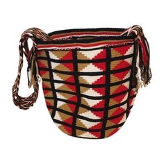 a red and black basket with tassels on the handles, sitting in front of a white background