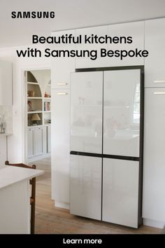 the samsung refrigerator is white and has black lettering on it that says beautiful kitchens with samsung bespoke