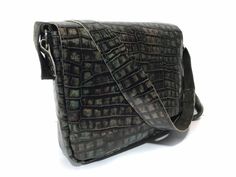 This beautiful green embossed crocodile leather messenger bag case is made with a high grade croco cow hide. The design is sleek and comfortable tha provided comfort and convenience when carrying. This is perfect bag for your essential tech gadgets. Dimensions: Internal: 12.83 X 9.29 X 1.42 inch / 32.6 X 23.6 X 3.6 cm External: 13.39 X 9.84 X 1.97 Inch / 34 x 25 x 5 cm Green Leather Satchel With Crocodile Pattern, Designer Green Bag With Crocodile Pattern, Messenger Bag Men, Crocodile Leather, Cow Hide, Leather Messenger Bag, Leather Messenger, Messenger Bags, Perfect Bag