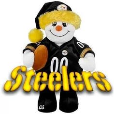 a stuffed snowman wearing a black uniform and yellow hat with the word pittsburgh on it