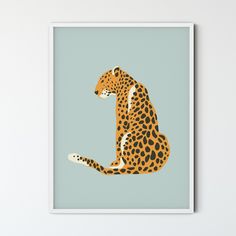 a poster with a cheetah sitting on it's back in front of a white wall