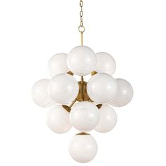 a chandelier with white glass balls hanging from it's brass frame and chain