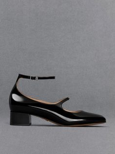 These sophisticated Mary Janes deserve a spot in your rotation. The sleek black finish is minimally embellished to preserve its classic allure, while the calf leather construction gives these shoes a luxurious feel. Dainty straps across the vamps and around the ankles wlll add feminine charm to the outfits you pair these with. Set on low block heels, they offer a flattering stature boost. Dress them up or down, these shoes will look just as good. Charles And Keith, Zapatos Mary Jane, Timeless Shoes, Platform Mary Janes, White Pumps, Mary Jane Pumps, Mary Jane Heels, Charles Keith, Low Block Heels