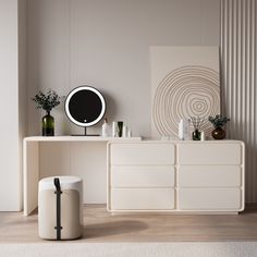 a white table with a round mirror on it next to a dresser and vases