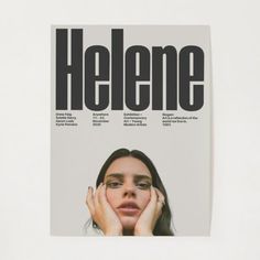 a magazine with a woman's face on the front cover and words underneath it