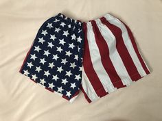 "Super cool USA flag shorts!!  Measurements (laying flat)... Waist: 12-17.5\" Hips: 25.5\" Rise: 12.5\" Inseam: 4\" Leg opening: 14\" Some yellowing around the waist - can be washed out - maybe pre-treat" American Flag Print Shorts For Memorial Day, Patriotic American Flag Bottoms For 4th Of July, American Flag Print Cotton Bottoms For Memorial Day, American Flag Cotton Bottoms For Memorial Day, Beach Shorts With Flag Print, Patriotic Flag Print Bottoms For 4th Of July, Patriotic Short Bottoms For 4th Of July, Patriotic Bottoms With Flag Print For 4th Of July, Patriotic American Flag Print Shorts