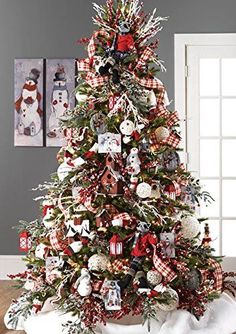 a christmas tree decorated with red and white ornaments