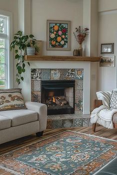 a living room filled with furniture and a fire place in the middle of the room