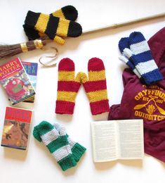 the contents of a harry potter costume laid out on top of a table with an open book