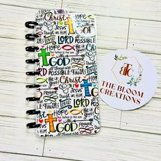 a spiral notebook with the words i love you written on it next to a sticker