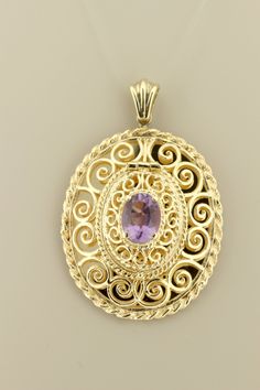 This wonderful filigree locket is made in 14K yellow gold and holds a spectacular purple topaz oval center. The piece measures 44.60mm long, 34.5mm wide and sits 13.17mm tall. If you need a chain to go with this, feel free to reach out to us and we can discuss options. B2264KALP --Please reference our policy for more details-- For International orders, please provide a phone number for shipping purposes. Just place a note in the comment box during check out.Thank you.** International wrist watch Purple Oval Filigree Jewelry, Oval Yellow Gold Filigree Jewelry, Oval Purple Jewelry With Intricate Design, Oval Locket, Filigree Pendant, Gold Locket, Oval Cut, Pendant Necklaces, Phone Number