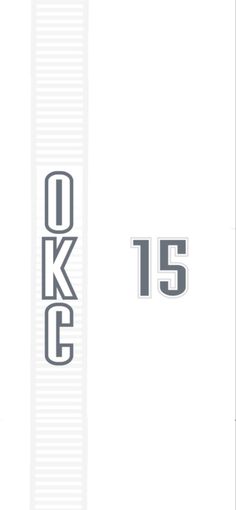 the back side of a white and gray book with black lettering on it, which reads okg 15