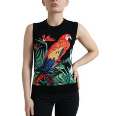 Indulge In The Epitome Of Italian Luxury With This Exquisite Dolce & Gabbana Tank Top. Crafted From A Premium Blend Of Virgin Wool And Silk, This Crew Neck Tank Top Showcases Intricate Bird Embroidery, Adding A Touch Of Elegance To Your Wardrobe. Its Sleek Black Color And Subtle Logo Details Reflect The Brand’s Dedication To Sophistication And Style. A Versatile Addition To Any Fashion Connoisseur’s Collection, This Top Is Sure To Make A Statement Whether Dressed Up Or Down. Material: 70% Virgin Bird Embroidery, Jungle Print, Silk Tank, Dolce E Gabbana, Style Chic, Black Logo, Dolce & Gabbana, Sleeveless Tank Top, Sleeveless Tank