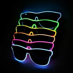 neon glasses are stacked on top of each other