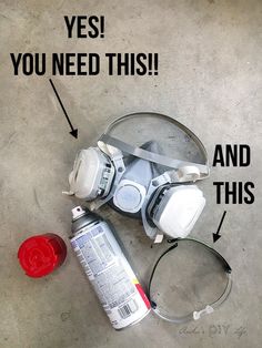 a gas mask, canister and other items on the ground with words that say yes you need this