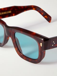 It takes several months to complete a pair of Cutler and Gross sunglasses – each is meticulously handcrafted in Italy by the brand's team of skilled craftspeople using time-honoured techniques. Sculpted in a D-frame profile, this style is made from tortoiseshell acetate that's hand-mopped to achieve a striking depth of colour. Cutler And Gross Glasses, Cutler And Gross, Acetate Sunglasses, Optical Glasses, Sunglasses For Men, Sunglasses & Glasses, Mr Porter, Square Frames, Tortoise Shell