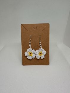 These earrings are very cute, and have lots of love crafted into them! I pack them all with lots of love and intentions that the customer will love it. I hope you love these earrings as much as I do! Jewelry Crochet, Gift Crochet, Crochet Daisy, Yellow Jewelry, Earring Handmade, Daisy Earrings, Love Craft, Crochet Gifts, Crochet Jewelry