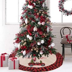 a christmas tree decorated with red and white ornaments