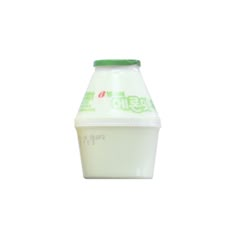 a plastic container filled with milk on top of a white surface