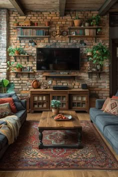 a living room filled with furniture and a flat screen tv mounted on a brick wall