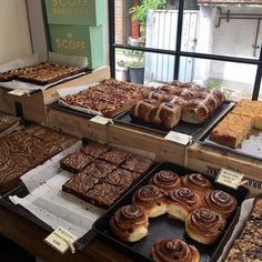 many different types of pastries are on display