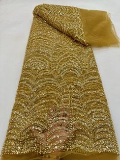 This high quality Fabric is measured in 5 Yards With Embroidered Beading and Sequin. It is soft, very delicate and beautiful. This high Quality Fabric is made with Fashion embroidered rhinestones can be used in making party wedding dresses, skirts, shawls, scarves and other other fashion apparels as you would like. Size : Length : 5 yards (180 inch). Width: 50 inch (Please allow slight deviation for the measurement data ,±1 inch) Material: 100% Polyester, Tulle Lace Fabric, Eco-Friendly embroide Beaded Party Dress, White Lace Fabric, Beaded Lace Fabric, Luxury Fabric, Pretty Beads, Sequins Embroidery, Tulle Lace, African Fabric, Beaded Lace