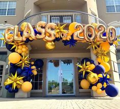 the entrance to class of 2020 with balloons and streamers in gold and blue colors