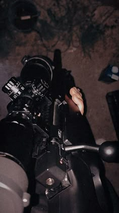 a close up view of the handlebars on a motorbike at night