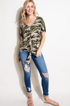 CAMOUFLAGE PRINT V NECK BUTTON DOWN FRONT SHORT SLEEVE FRONT TIE BOTTOM PLUS TOP95% RAYON, 5% SPANDEX MADE IN USA1X/2X/3X 2-2-2 Style: Casual Print / Pattern: CAMOUFLAGE PRINT Fit: Regular Neck Line: V NECK Sleeve: SHORT SLEEVE Closure: FRONT TIE BOTTOM Lining: No Made In: Made In U.S.AFabric Contents: 95% RAYON, 5% SPANDEXNon-sheer fabricCare Instructions: Machine wash cold, do not bleachSize Measurement (inch): 1X: 44.0-46.0 (Bust), null (Waist), null (Hips), null (Length) 2X: 46.0-48.0 (Bust) Camouflage Print, Sheer Fabrics, Print Pattern, Fabric Care, Camouflage, Button Downs, Camo, Print Patterns, Top Outfits