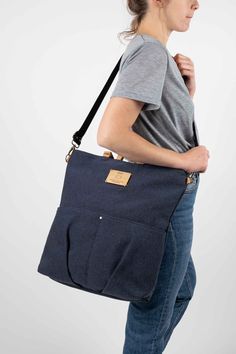 "Gray tote bag convertible in a backpack purse, and personnalisable! It will become your canvas backpack for everything! It's a work tote for your laptop, a comfortable convertible canvas backpack that keeps your hands free, and a hand bag. To transform the tote bag into a backpack, simply tuck the backpack straps into a back panel, and for a crossbody bag use one of the straps. ♻️🌱🐰VEGAN, RECYCLED AND ANIMAL FRIENDLY MATERIALS: * Fabric made of recycled fabrics from textile waste. Manufacture Large Capacity Cotton Backpack, Large Capacity Cotton Standard Backpack, Versatile Canvas Satchel With Zipper, Versatile Canvas Tote Bag With Zipper, Versatile Canvas Tote Bag With Zipper Closure, Versatile Canvas Bag With Zipper For Daily Use, Versatile Canvas Bag With Zipper Closure For Daily Use, Versatile Canvas Bag With Zipper Closure, Canvas Shoulder Bag For Daily Use