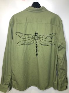 Jacket recovered in thrift store, entirely embroidered by hand from a pattern created by myself. It is size M unisex, it is a unique piece. Do not wash it above 30 degrees, use the lowest spin cycle. Winter Cotton Outerwear With Custom Embroidery, Casual Long Sleeve Outerwear With Machine Embroidery, Custom Embroidered Cotton Outerwear For Fall, Spring Long Sleeve Outerwear With Embroidered Graphics, Cotton Outerwear With Custom Embroidery For Fall, Embroidered Green Cotton Outerwear, Green Embroidered Cotton Outerwear, Casual Embroidered Cotton Outerwear, Casual Fall Outerwear With Custom Embroidery