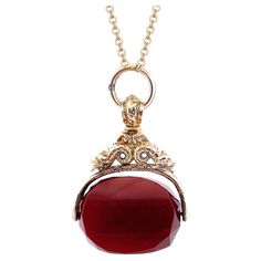 Elevate your style with our extraordinary 10K yellow gold Spinning Carnelian Watch Fab Pendant. This exquisite pendant showcases a beautiful carnelian stone that spins within an intricate gold holder. The captivating carvings on the gold holder add a touch of sophistication and artistry. Selling Price: $ 1400.00 Carnelian Stone, Ear Jewelry, Dream Life, Jewelry Necklace Pendant, Art Nouveau, Jewelry Necklaces, Fashion Accessories, Yellow Gold, Pendant Necklace