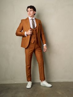 PLEASE READ BEFORE ORDERING 3-piece Signature Men's Slim Fit Suit consists of a high quality jacket, double breasted vest, and pants set. Notch Lapel Jacket offers side vents for ventilation and comfort. Slim Fit Jacket is plus 6 of your dress pant waist size. Men's 3-Pieces Slim Fit Suit is a very slim cut. Make sure to keep allowances in mind. Pants need to be hemmed to compliment your height.  Waist size may be altered up to two (2) inches. Material consists of luxury wool blend.  Wrinkle-fre Copper Suit, Orange Suit, Double Breasted Vest, Slim Fit Suit Men, Suit Ideas, Wedding Dress Men, Groom Groomsmen, Lapel Jacket, Groomsmen Suits