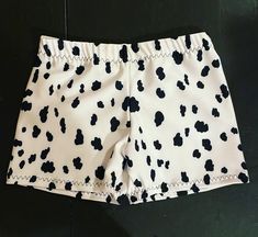 Dance/Gymnastic/cheer practice shorts in cow design.  Made of 4-way stretch spandex fabric.  Full bottom coverage ensures that the shorts won't ride up during  the most aggressive moves.  All Shorts are handmade in the USA and are made to order. If you have specific questions about sizing you can message me and I will do my best to answer any questions you have. I always advise to go by your street size only. Care: Please wash in cold water only on a gentle cycle  or hand wash and lay flat to dr Cheer Practice Wear, Gymnastics Shorts, Cheer Shorts, Cheer Practice, Dance Gymnastics, Practice Wear, Cow Design, Girls Sports, Cheer Dance