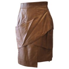 1990s Gianni Versace brown leather skirt totally made in italy size 44 it Formal Brown Leather Skirt, Chic Brown Leather Mini Skirt, Elegant Brown Leather Skirt, Formal Brown Knee-length Skirt, Brown Knee-length Skirt For Formal Occasions, Leaf Skirt, Brown Leather Skirt, Feather Skirt, Versace Couture