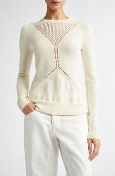 The German design house known for its minimalist essentials masterfully knits rich wool-and-cotton yarn to create an intricately pointelle-detailed sweater. Crewneck Long sleeves Ribbed cuffs and hem 67% wool, 33% cotton Dry clean Made in Italy Designer Clothing Chic Cashmere Sweater With Pointelle Knit, Crew Neck Cashmere Sweater With Pointelle Knit, Cashmere Pointelle Knit Crew Neck Sweater, Spring Cashmere Sweater With Pointelle Knit, Long Sleeve Merino Wool Sweater In Pointelle Knit, Long Sleeve Merino Wool Pointelle Sweater, Long Sleeve Merino Wool Sweater With Pointelle Knit, Chic Turtleneck Sweater With Pointelle Knit, Chic Turtleneck Pointelle Knit Sweater