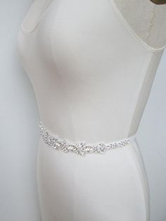 Wedding belt Bridal belt sash Crystal belts sashes Elegant Silver Belt With Rhinestones, Formal Bridal Belt With Crystal Sashes, Formal Crystal Bridal Belt With Sashes, White Crystal Sash For Formal Occasions, White Crystal Sashes For Formal Occasions, Formal White Crystal Sash, Elegant White Belt With Rhinestones, Silver Fitted Bridal Belt For Formal Occasions, Adjustable Silver Crystal Bridal Belt