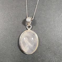 This is a 925 sterling silver pendant with an oval genuine Rose Quartz gemstone. I only have one of these.  The rose quartz is very pale, and not dyed, natural rose quartz in a smooth cabochon cut. My family acquired a large set of jewelry back in 2000 from a jewelry store that went out of business. This pendant is part of that lot.  ◄ NECKLACE OPTIONS ► You may purchase the pendant only, or on an 18" sterling silver box chain. The chain is rhodium-plated which is a non-tarnish finish and is con Antique Ring Settings, Set Of Jewelry, Landfill Waste, Small Jewelry Box, Going Out Of Business, Rose Quartz Gemstone, Pink Paper, Silver Box, Oval Pendant