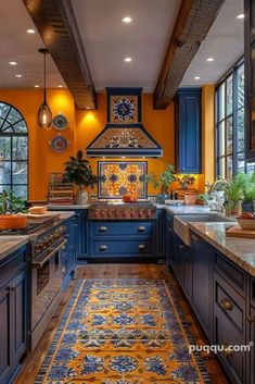 a kitchen with blue cabinets, yellow walls and an area rug on the floor that matches