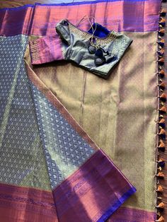 Kanchipuram/Kanjivaram Handloom Gold/Copper/Purple Tissue Semi Silk Saree | Kanchipattu Traditional Saree | 8 inch Border | Indian Saree | Blouse 40 size with Maggam work DETAILS: Blouse : Included (stiched) with Maggam work in 40 size Fall: Included Edges: Finished edges Material Excluding Design: Semi Silk Saree weight: 2 lb  Saree Length: 5. 5 meters Saree color: Purple/Gold Shinny Pallu color: Copper/Gold/Purple Border color: Purple/Copper Blouse piece color: Purple/Gold Mix Zari Shinny PROD Ceremonial Purple Saree For Diwali, Ceremonial Multicolor Saree With Self Design, Ceremonial Multicolor Self Design Saree, Ceremonial Purple Traditional Wear With Pallu, Multicolor Bollywood Saree With Latkans, Bollywood Style Multicolor Saree With Latkans, Multicolor Diwali Saree With Latkans, Multicolor Saree With Latkans For Diwali, Transitional Traditional Saree With Latkans