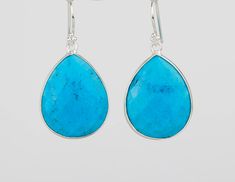 A pair of natural turquoise stones set in gold vermail (gold lated over sterling silver) or sterling silver bezel: 1. Stone : Turquoise (natural gemstone) 2. Stone size: 22 x 20 mm for gold framed version; 26x21 for the silver framed version 3. earring total length ~36 mm/41mm 4. bezel material: gold vermail (gold over sterling silver) or sterling silver 5. earring hook: gold vermail or sterling silver 6. an optional custom jewelry card printed with your personalized message Earrings in other co Turquoise Earrings Gold, Bezel Set Earrings, Engraved Locket, Natural Turquoise Stone, Real Turquoise, Jewelry Card, Emerald Earrings, Natural Turquoise, Turquoise Earrings