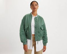 With its bomber jacket look, middle zip-up front, oversized flap pockets and ribbed cuffs and hem, this Andy Tech Jacket will be a mainstay in your closet for years to come. A mid-zip jacket staple Cut with a standard fit Features oversized flap pockets Finished with ribbed cuffs and hem Crafted with warm synthetic fill Urban Outerwear With Zip Cuffs For Spring, Spring Streetwear Track Jacket With Zip Cuffs, Spring Urban Track Jacket With Ribbed Cuffs, Levi's Outerwear For Spring Streetwear, Levi's Spring Streetwear Outerwear, Urban Spring Varsity Jacket With Pockets, Casual Varsity Jacket With Zipper For Spring, Urban Outerwear With Ribbed Cuffs For Spring, Relaxed Fit Spring Outerwear With Zip Cuffs