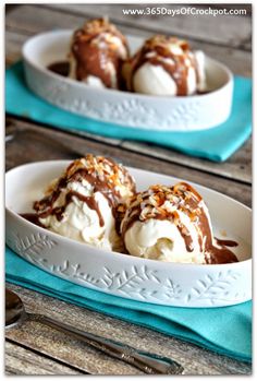 two bowls filled with ice cream covered in chocolate