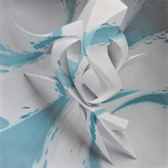 an abstract blue and white paper sculpture