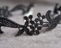 This unique & delicate studded choker is one of our Best Sellers! The Sophia Black Lace Choker Necklace is an absolute must-have for anyone looking to elevate their outfit. Its dainty silver-plated brass beads and unique floral lace design brings a touch of glam to your look. Upgrade your wardrobe with something that's not over-the-top yet still lifts your style up a notch. Lightweight, soft, and able to bend or fold easily The smooth finishing guarantees an easy and comfortable fit. Adjustable Sparkly Choker, Outfits For Casual, Black Lace Necklace, Black Lace Choker Necklace, Sophia Black, Black Lace Choker, Prom Necklaces, Lace Choker Necklace, Lace Accessories