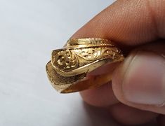 Beautiful handmade Pure Gold handmade Engraved ring by one of our most professional Artist, its and Handmade Artisian so Don't be worry about quality and finish we will take care of it for you. Pure 21k Gold Ring for wedding or engagement also useful for Anniversary Occasions Best Ring for ladies on their beautiful Occasions we care about Flawless Ring Pure gold, Hard shine great polishing would be done by our team mates We can make sizes as per buyer choice Shipping through FedEx as soon as we Engraved 22k Gold Rings For Wedding, Victorian 22k Gold Jewelry For Weddings, Victorian Gold Rings For Marriage, Traditional Gold Engraved Ring With Decorative Band, Traditional Engraved Ring With Intricate Design For Formal Occasions, Traditional Hallmarked Engraved Ring For Formal Occasions, 22k Gold Engraved Rings For Ceremonial Occasions, 22k Gold Antique Rings For Ceremonial Occasions, Antique 22k Gold Rings For Anniversary