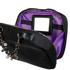 Main Bag Dimensions: 9.5” W x 7” H x 3” D Removeable Pouch Dimensions: 8” W x 5.6” H x 1.5” D Dual zipper puller opening Interior pockets Large slide pocket; perfect for make up palettes 4 smaller slide pockets 4 elastic bands to hold brushes Removeable mirror Removeable PVC clear toiletry pouch 4 TSA approved toiletry bottles Removeable faux leather tag Chain top handle with dog clip & glass jewels & pearls (strap can be unclipped to attach to luggage bag) Metal badge with glass jewels Quilting Portable Handheld Cosmetic Bag For Travel, Elegant Square Cosmetic Bag For Travel, Versatile Rectangular Cases With Zipper Pocket, Rectangular Cases With Zipper Closure For On-the-go, Versatile Rectangular Case With Zipper Pocket, Portable Square Travel Pouch, Rectangular Cosmetic Bag With Zipper For Travel, Rectangular Cosmetic Bag With Zipper For On-the-go, Travel Box Bag Clutch With Zipper Closure