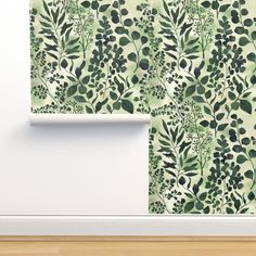 an image of a wallpaper with green leaves and berries on it in a room