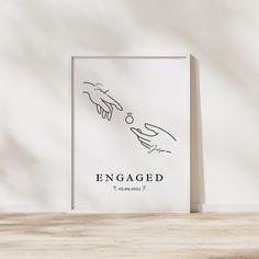 a poster with two hands reaching for each other in front of a white wall that says engaged